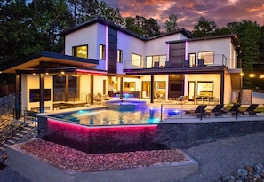 Dive into relaxation with this stunning pool area. Perfect for summer days and starry nights.
