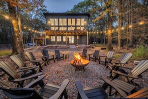 Gather round the outdoor firepit for evenings filled w/ laughter & warmth