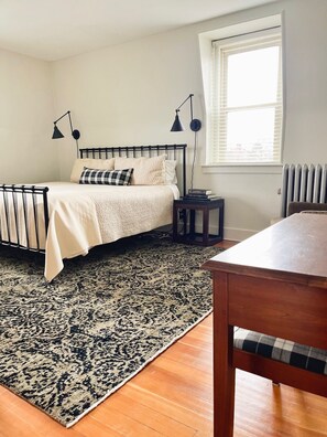 Spacious bedroom with king bed and high quality linens for a good night's sleep