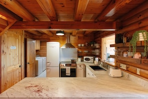 Fully stocked kitchen with retro appliances, mountain views from the sink, and packed with everything needed to cook your favorite meals. What else do you need?!