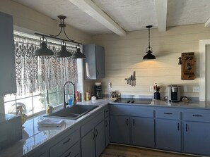Kitchen with a cooktop