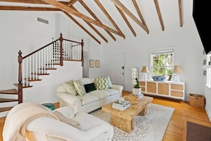 The high ceilings and wood beams are so inviting and calming.