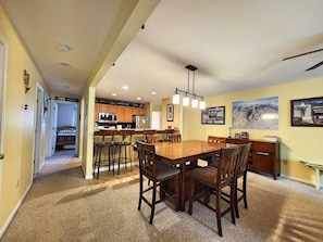 Dining/kitchen area with 3rd bedroom visible