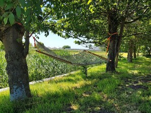 Hammock in the garden to enjoy the Dutch landscape view.