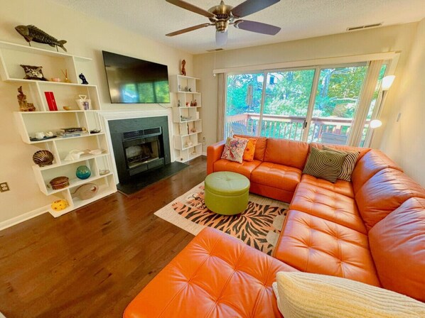 Unwind in style on this spacious leather sectional-the perfect spot for cozy conversations!