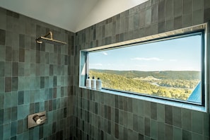 Luxurious Shower Retreat: Unwind with breathtaking views and elegant tile detail!