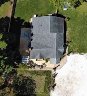 Cottage Bluefish is a single family home with fenced backyard & wrap-around deck
