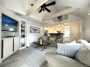 Living room with comfy couches and smart TV