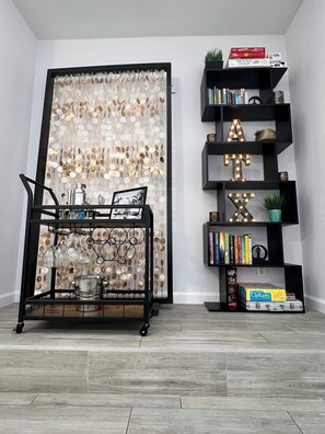 The "fun corner" with bar cart, books and games. 