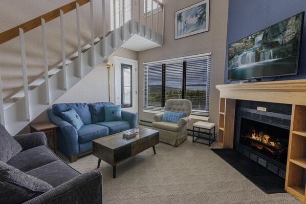 Welcome to Silver Creek 5313, an inviting 2-bedroom loft property ready to host you in Snowshoe!  Enjoy lounging in the living room with the Smart TV and an electric fireplace.