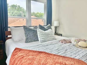 King bed with upscale linens ensuring a comfortable night.