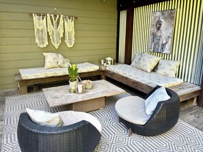 Enjoy the view of the forest from this spacious and tranquil deck.