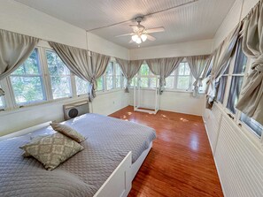 This bedroom gets plenty of natural light.