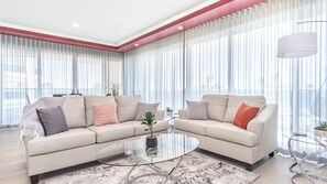 the living room with the curtains  drawn