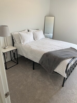 Master bedroom with queen bed