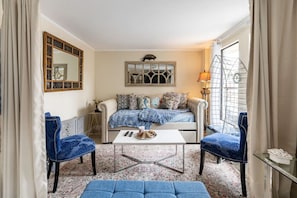 Wow, a second living room roomy light & bright comfortable seating, fun bar, and a great hangout spot overlooking the tranquil home on the canal for happy hour and conversations. In the evening this becomes a second bedroom with two more sleeping are