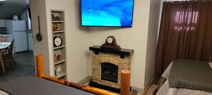 TV and a Warm Fireplace