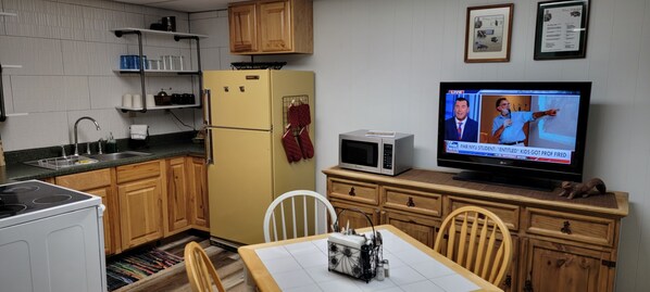 Fully Equipped Kitchen and Dining Area