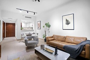Living Room: Bright and inviting space with stylish decor and views perfect for relaxation!