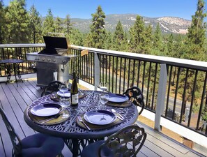 Enjoy al fresco dining and a BBQ grill with a stunning mountain view!
