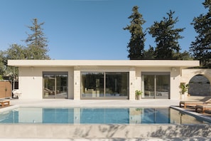 Sophisticated pool surroundings offering a sense of tranquility.