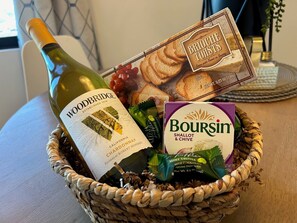 Waiting in your room is a bottle of wine, cheese and brioche crackers and some of our favorite local chocolates.