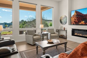 Great room with walls of windows
