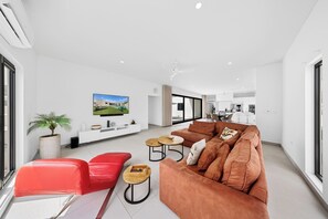 Well-designed living area of the home  in Noord, Aruba - Enjoy the comfy arrangement of sofas for your utmost comfort - Elegantly decorated space providing a refreshing ambiance - Availability of smart TV and Netflix  for entertainment