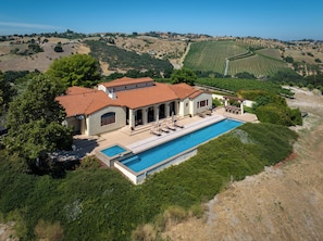 Relax in the beautifully landscaped backyard with panoramic view