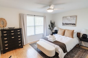 Master bedroom with queen bed, attached full bath, closet and bedside charging station. Large Samsung SMARTV on adjacent wall. (not pictured)