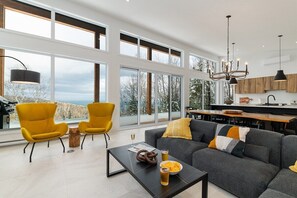 Step into bright spaces with stunning forest and valley views.