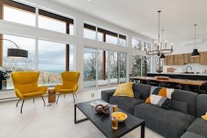 Step into bright spaces with stunning forest and valley views.