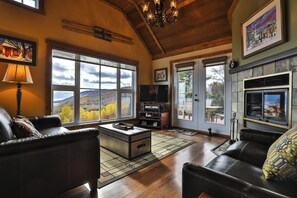 Spacious rooms invite summer laughter and unforgettable views.