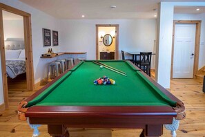 Challenge friends to a fun game of pool.