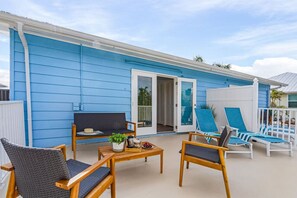 Your upper deck with plenty of seating and loungers for sun bathing