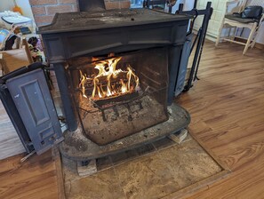 Franklin Stove between Dining Area and Kitchen