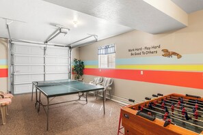 Bonus rec room with foosball and ping pong