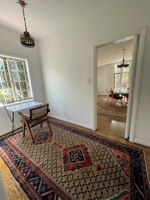 Dining Nook/Mini-Office 6x12. Office desk, chair and vintage rug.