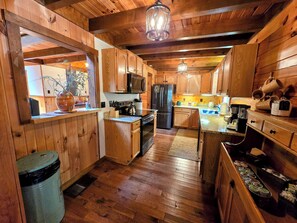 A fully stocked kitchen is ready for you to cook your favorite meal! 