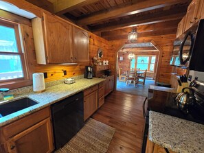 The kitchen comes fully equipped with all the small appliances necessary to prepare a meal. 
