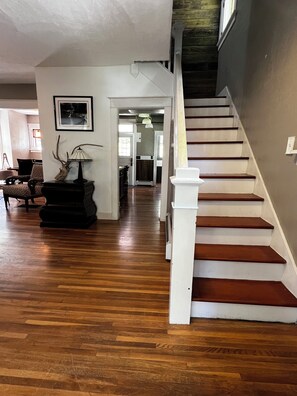 Entryway and stairs to the bedrooms/bathroom