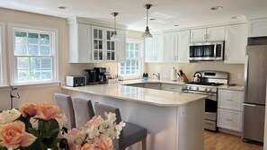 Gorgeous kitchen for cooking meals and socializing with family and friends