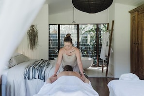 Enjoy a massage in your room (note photo taken in alternate boathouse with bath)