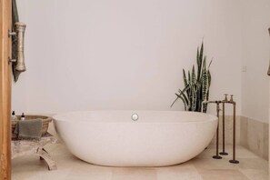 Featuring double stone baths throughout