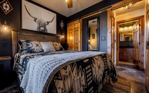 Main level bedroom with Queen bed.