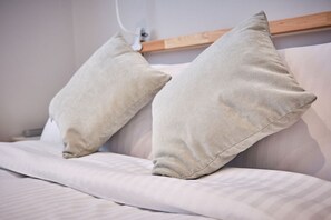 High-quality linens, sheets, and enough pillows to start a small pillow war.