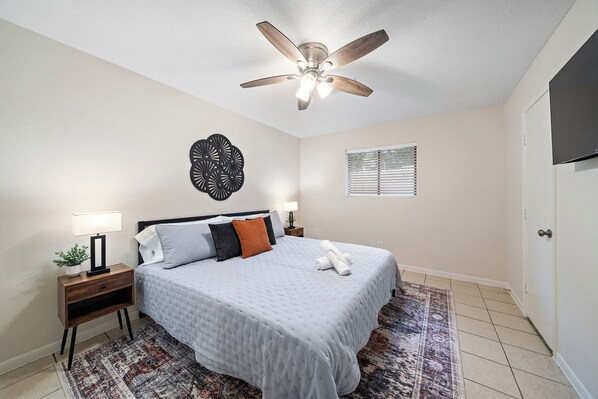 Chic simplicity for restful nights—our guest room is a blend of comfort and style