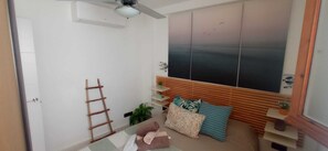 Another view of the master bedroom, with the split AC unit visible