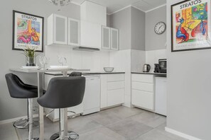 Kitchenette with a kettle.