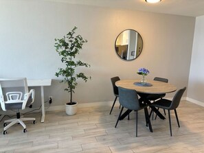 4-seat round table and a working desk